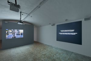 *Coup d’éclat*, exhibition view, Fort du Bruissin, 2011. Featuring Aníbal Parada, *Reflection on exhibition*, 2009, single-channel projection, 4’10’’. Photo: Blaise Adilon