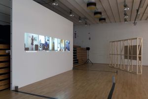 View of the exhibition *The Whole World Is Watching*, Magasin-CNAC auditorium, 2012. On the image: Natalie Bookchin, *Mass Ornament*, 2010, video installation. Photo: Blaise Adilon