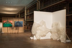 View of the exhibition *Il faut qu’il se passe quelque chose*, former museum of painting, Grenoble, from 6 December 2015 to 3 January 2016. Akim Pasquet,
*Sans titre (Susceptibilité)*, 2014 (foreground). Blandine Herrmann, *Sans titre*, 2014 (background). Photo: Renaud Menoud